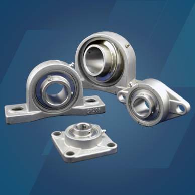  4 stainless steel bearings with open and closed covers on a blue background